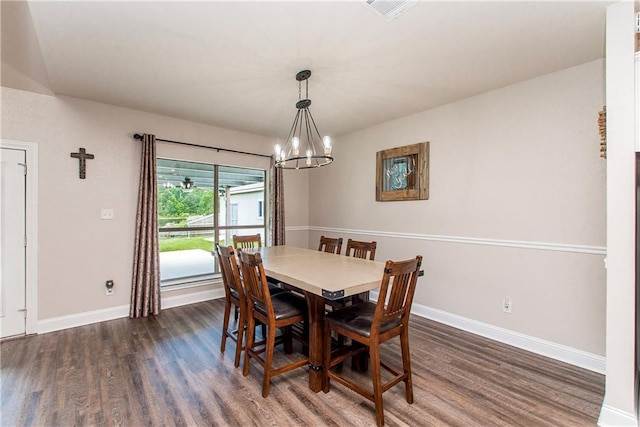 42013 Red Maple St, Hammond, LA 70403 - dining room with wood finished floors and a chandelier