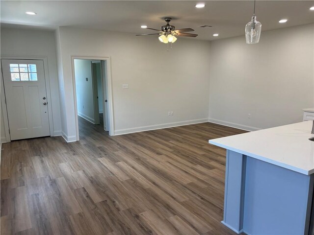 2035 Huey P Lng Ave, Gretna, LA 70053 - unfurnished dining area featuring recessed lighting, a ceiling fan, and dark wood-style floors