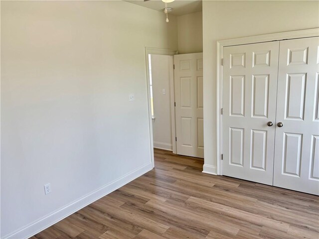 2035 Huey P Lng Ave, Gretna, LA 70053 - unfurnished bedroom featuring light wood-style flooring and a closet