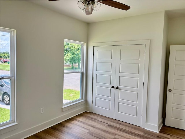 2444 Huey P Long Ave, Gretna, LA 70053 - unfurnished bedroom featuring a closet, wood finished floors, and ceiling fan