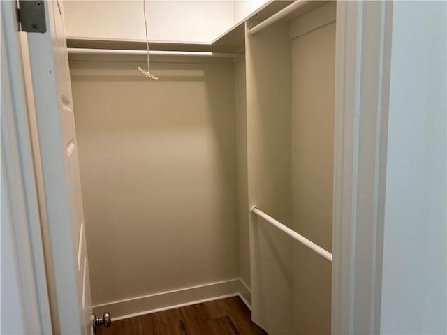 2019 Huey P Long Ave, Gretna, LA 70053 - walk in closet with dark wood finished floors