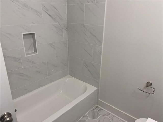 2019 Huey P Long Ave, Gretna, LA 70053 - full bathroom featuring baseboards and bathtub / shower combination