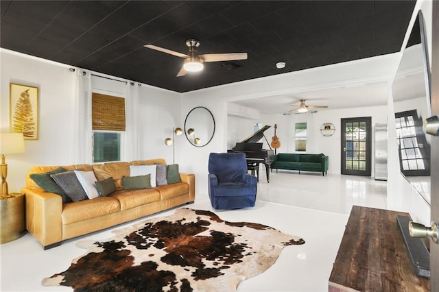 108 Cadow St, Paradis, LA 70080 - living room featuring ceiling fan, crown molding, and tile patterned flooring