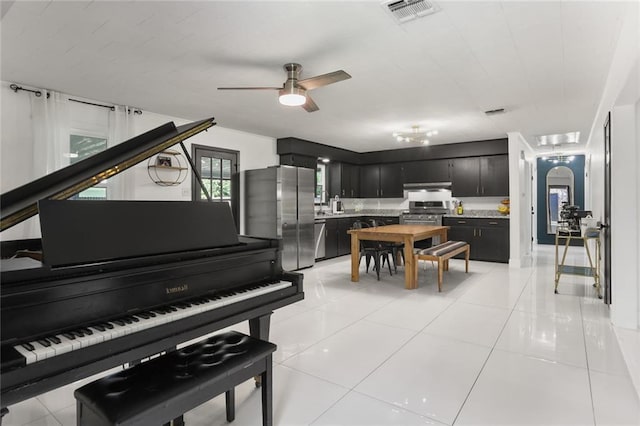 108 Cadow St, Paradis, LA 70080 - living room with ceiling fan and light tile patterned flooring