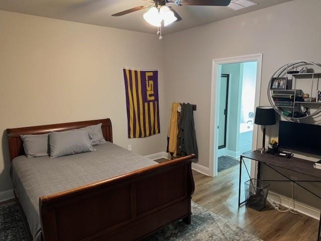 7248 Kenilworth Crossing Ave, Baton Rouge, LA 70820 - bedroom with wood finished floors and ceiling fan