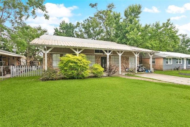 453 Olive Dr, Slidell, LA 70458 - ranch-style home featuring concrete driveway and a carport
