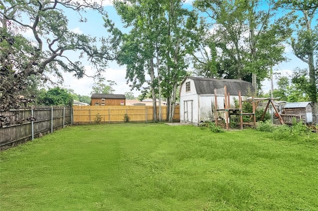 453 Olive Dr, Slidell, LA 70458 - fenced backyard featuring a storage unit