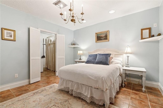 515 Sidney St, Metairie, LA 70005 - bedroom featuring a chandelier and tile patterned flooring