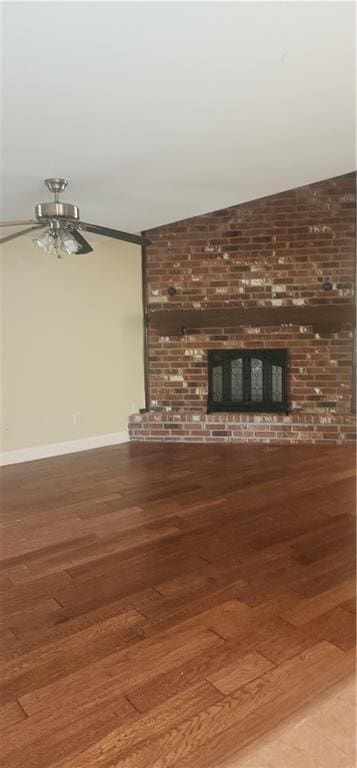 105 Parkbrook Cir, Slidell, LA 70460 - unfurnished living room featuring a fireplace, wood-type flooring, and ceiling fan