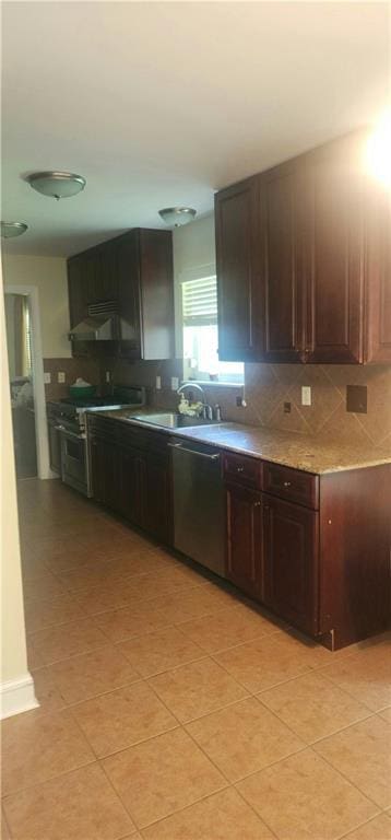 105 Parkbrook Cir, Slidell, LA 70460 - kitchen with electric stove, decorative backsplash, dishwasher, under cabinet range hood, and light countertops