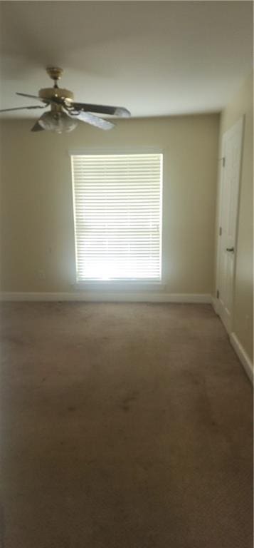 105 Parkbrook Cir, Slidell, LA 70460 - empty room featuring light carpet and a ceiling fan
