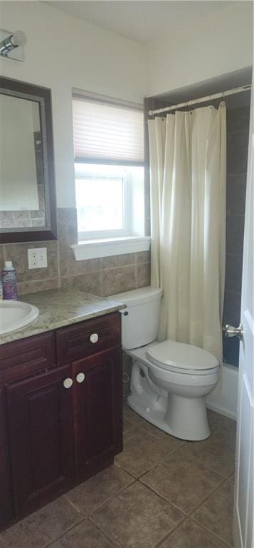 105 Parkbrook Cir, Slidell, LA 70460 - full bath featuring vanity, curtained shower, backsplash, and tile patterned floors