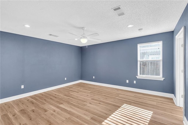 506 Ellington Ave, Luling, LA 70070 - unfurnished room with a ceiling fan, a textured ceiling, light wood-style floors, and recessed lighting