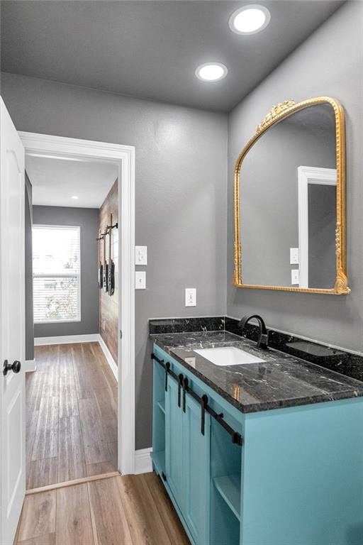 506 Ellington Ave, Luling, LA 70070 - bathroom featuring vanity and wood finished floors