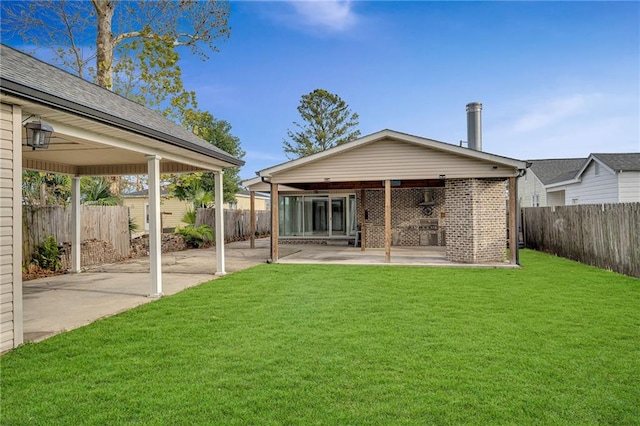 506 Ellington Ave, Luling, LA 70070 - rear view of property with a patio area, a fenced backyard, and brick siding
