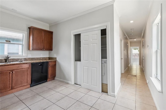 8711 Olive St, New Orleans, LA 70118 - kitchen with dishwasher, light tile patterned floors, ornamental molding, dark stone countertops, and brown cabinets