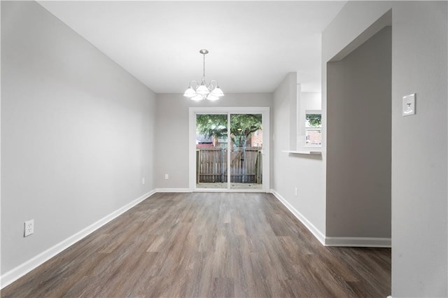 5720 Count Ln, New Orleans, LA 70126 - unfurnished dining area featuring wood finished floors and a chandelier
