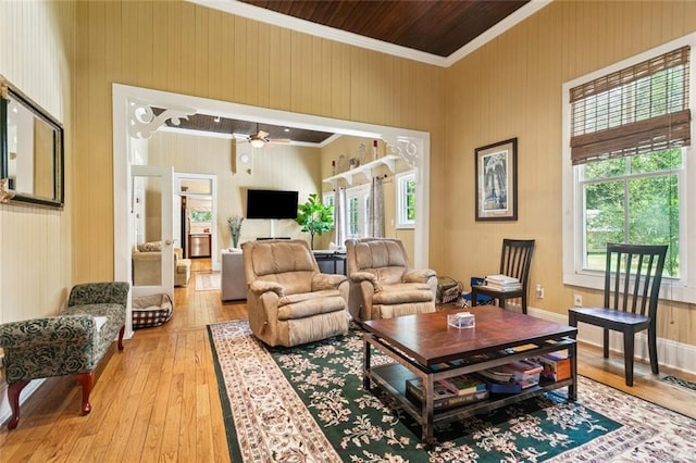 39267 Z Oaks Ln, Ponchatoula, LA 70454 - living room with light wood finished floors, ornamental molding, and a ceiling fan