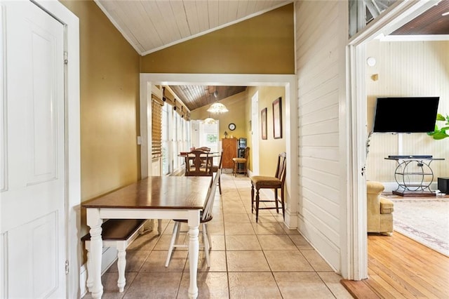 39267 Z Oaks Ln, Ponchatoula, LA 70454 - hall with lofted ceiling, ornamental molding, wooden ceiling, light tile patterned flooring, and wooden walls