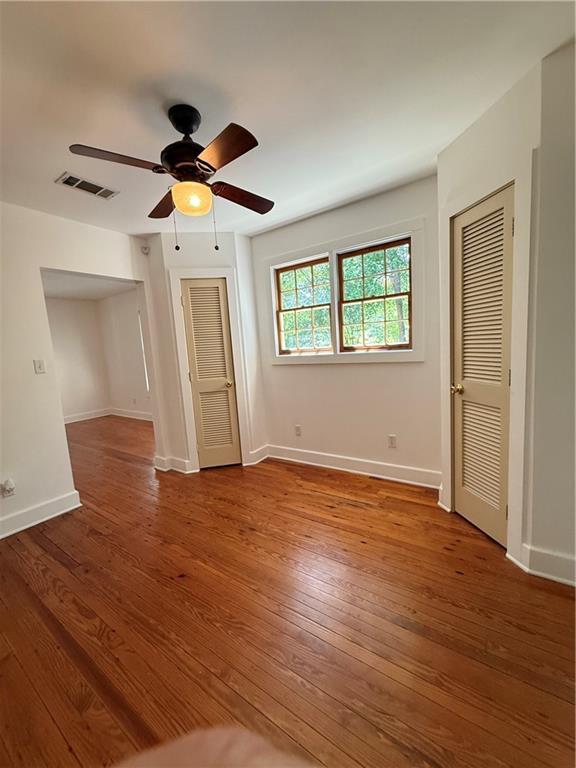 312 W 20th Ave, Covington, LA 70433 - unfurnished room with wood-type flooring and ceiling fan