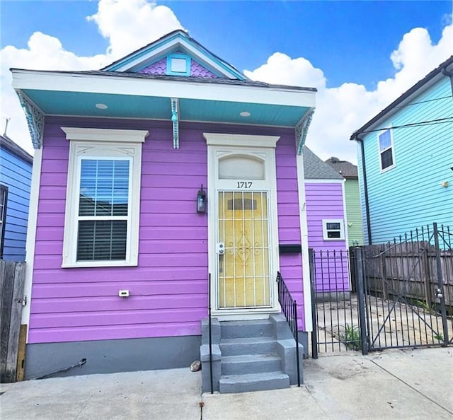 1717 Governor Nicholls St, New Orleans, LA 70116 - shotgun-style home featuring entry steps