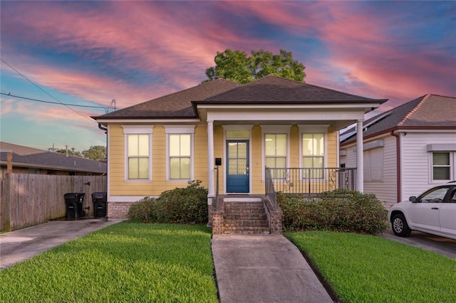 2060 Saint Denis St, New Orleans, LA 70122 - view of front of house with covered porch and a shingled roof