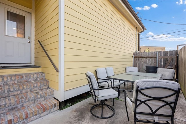 2060 Saint Denis St, New Orleans, LA 70122 - view of patio featuring outdoor dining space and entry steps