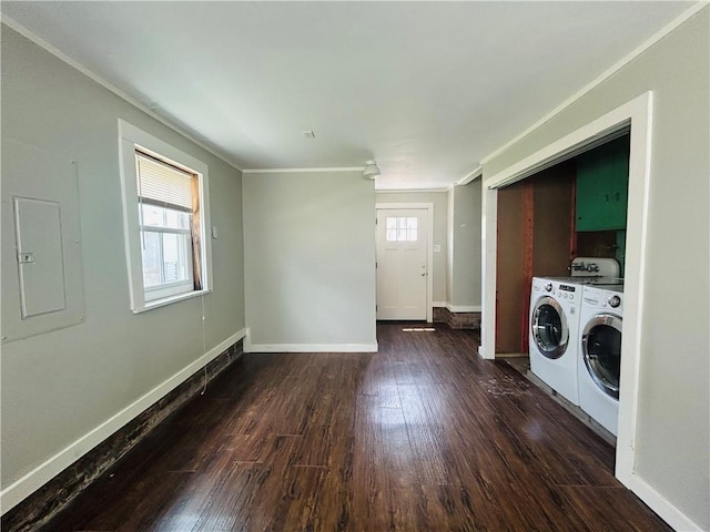 402 Orion Ave, Metairie, LA 70005 - laundry room featuring electric panel, dark wood-style flooring, washer and dryer, and crown molding