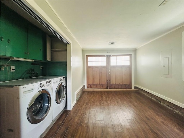 402 Orion Ave, Metairie, LA 70005 - washroom featuring cabinet space, dark wood-style floors, independent washer and dryer, electric panel, and ornamental molding