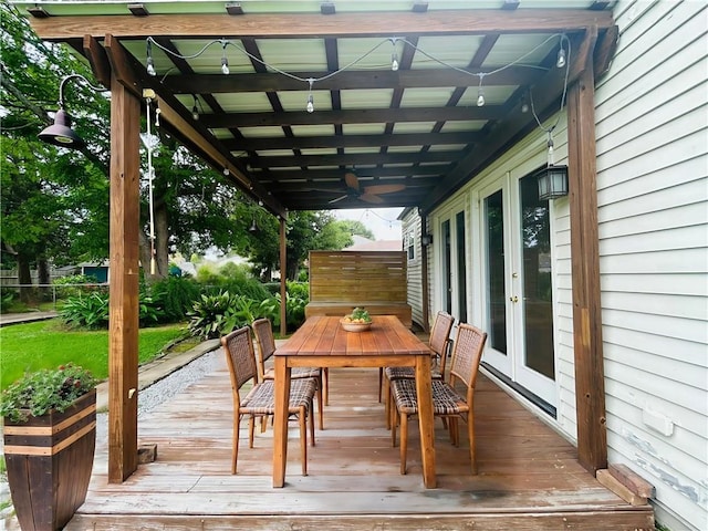 402 Orion Ave, Metairie, LA 70005 - wooden deck featuring french doors, outdoor dining space, and a ceiling fan