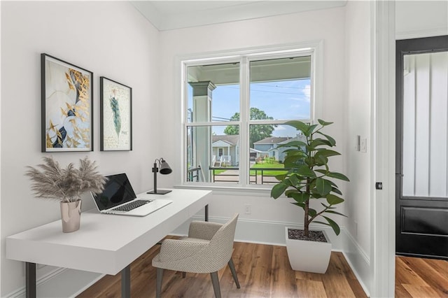 7717 Richard St, Metairie, LA 70003 - home office featuring wood finished floors and baseboards
