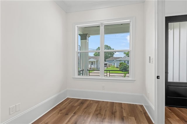 7717 Richard St, Metairie, LA 70003 - unfurnished room with dark wood-type flooring and baseboards