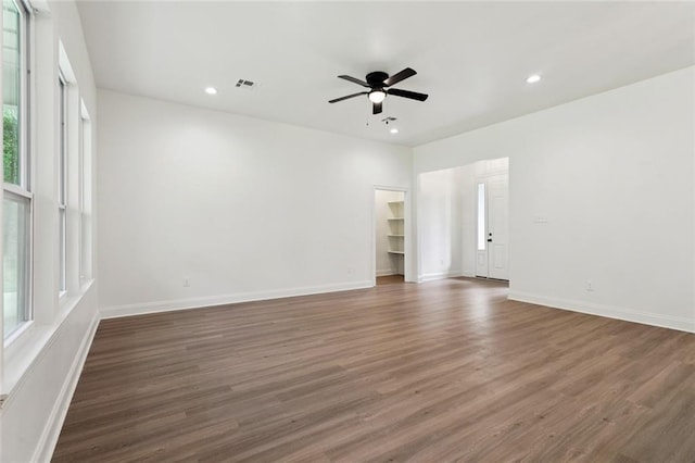 69206 4th Ave, Covington, LA 70433 - unfurnished room with wood finished floors, ceiling fan, and recessed lighting