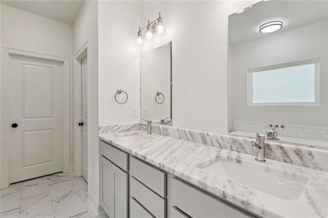69206 4th Ave, Covington, LA 70433 - bathroom featuring marble look tile flooring, double vanity, and a tub to relax in