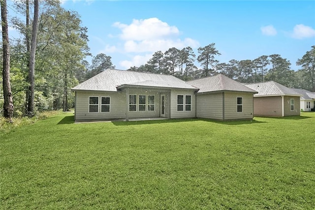69206 4th Ave, Covington, LA 70433 - back of property featuring a yard
