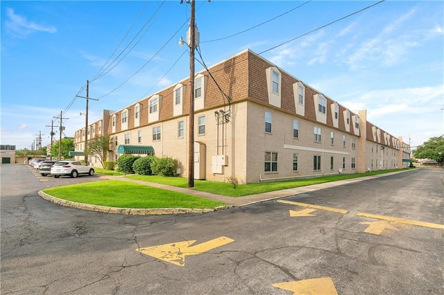 2700 Whitney Pl Unit 826, Metairie, LA 70002 - view of property featuring uncovered parking