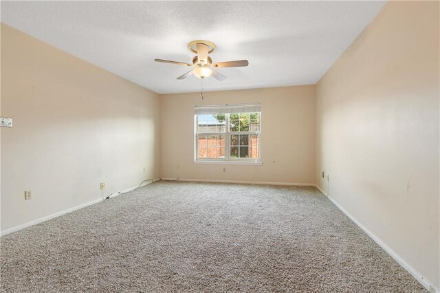 2700 Whitney Pl Unit 826, Metairie, LA 70002 - carpeted empty room with a ceiling fan and a textured ceiling