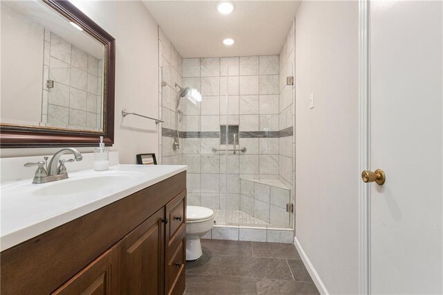 2700 Whitney Pl Unit 826, Metairie, LA 70002 - full bathroom featuring vanity, a shower stall, recessed lighting, and tile patterned flooring