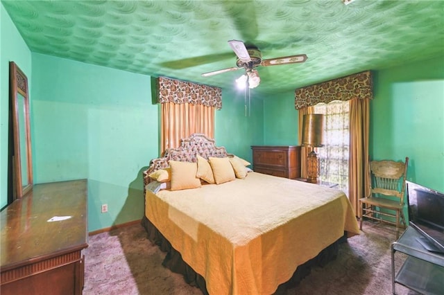 1319 Sumner St, New Orleans, LA 70114 - bedroom featuring ceiling fan, dark carpet, and a textured ceiling