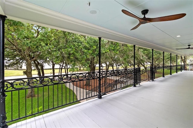 2801 Lakeshore Dr, Mandeville, LA 70448 - patio / terrace featuring a ceiling fan and a lawn