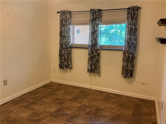 34121 Longleaf Ln, Slidell, LA 70460 - spare room featuring baseboards