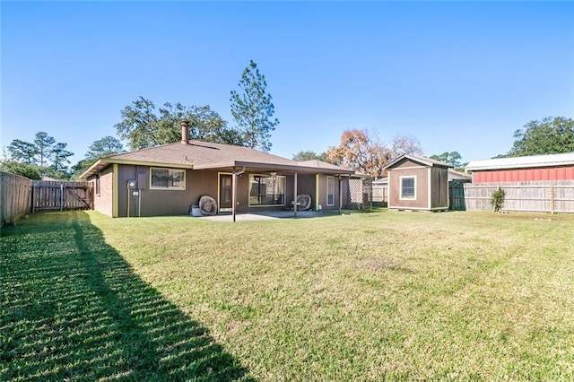 806 N Pearl Dr, Slidell, LA 70461 - back of house with a patio, a fenced backyard, and a shed