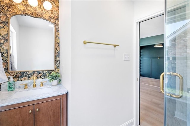 145 Macque Dr, Harahan, LA 70123 - full bath with vanity, a shower stall, and wood finished floors