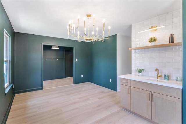 145 Macque Dr, Harahan, LA 70123 - kitchen with stainless steel dishwasher, light wood-type flooring, a center island, open floor plan, and recessed lighting