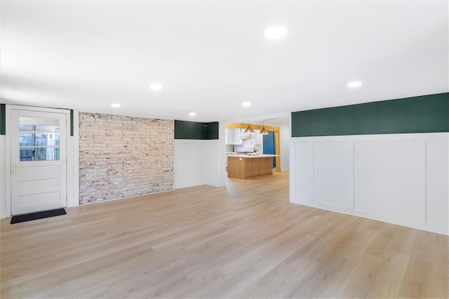 145 Macque Dr, Harahan, LA 70123 - empty room featuring plenty of natural light, light wood-style floors, and a ceiling fan
