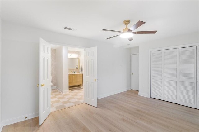 145 Macque Dr, Harahan, LA 70123 - unfurnished room featuring light wood finished floors and a ceiling fan