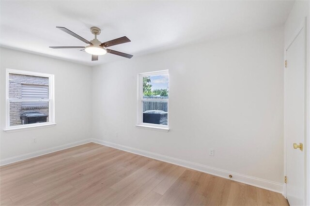 145 Macque Dr, Harahan, LA 70123 - empty room featuring lofted ceiling, light wood-style flooring, and a ceiling fan