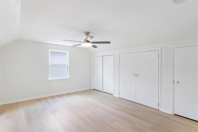 145 Macque Dr, Harahan, LA 70123 - full bathroom featuring double vanity, marble look tiles, a tub to relax in, a shower, and lofted ceiling