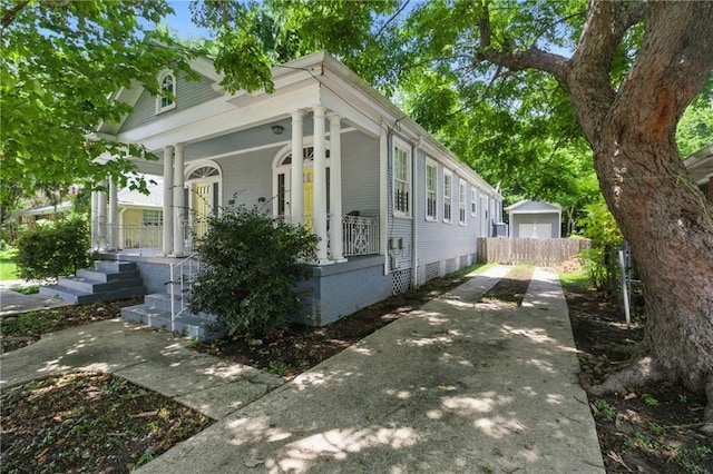 322426 Calhoun St, New Orleans, LA 70125 - view of side of property with a porch and driveway