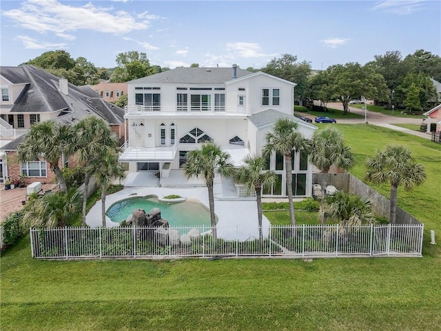 3128 Palm Vista Dr, Metairie, LA 70003 - back of house featuring a balcony, a fenced backyard, stucco siding, and a patio area